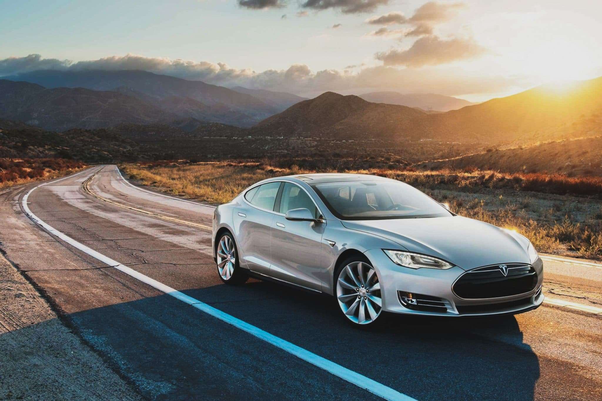 A Tesla EV on the road.