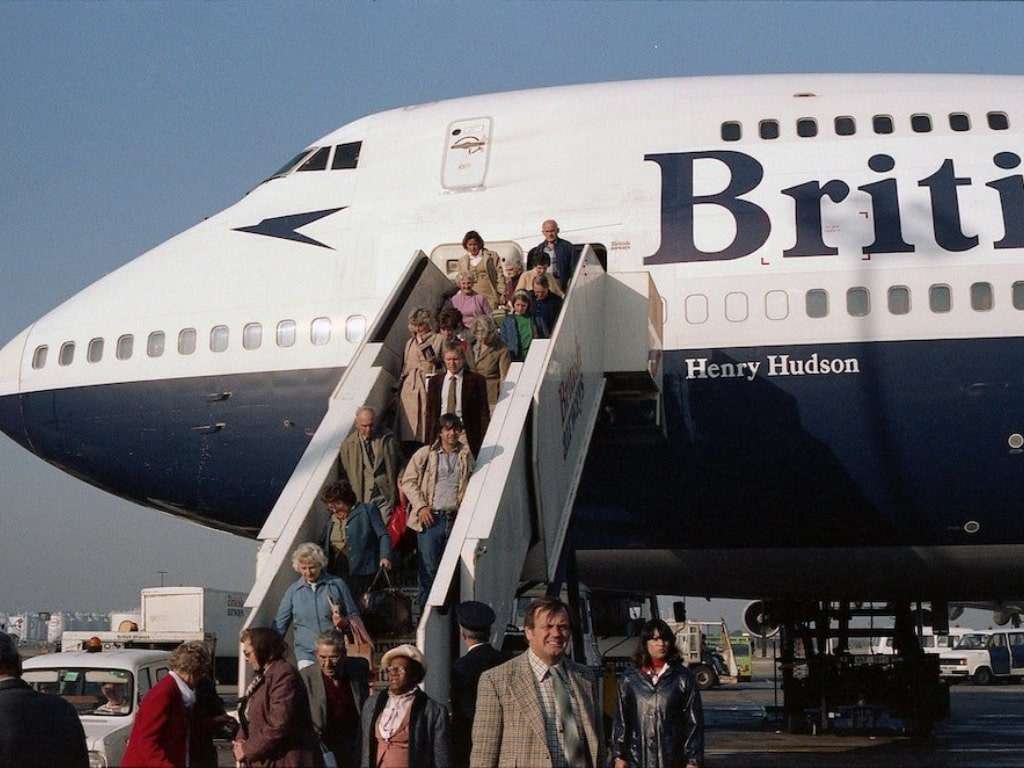 passengers deboarding a British Airways flight
