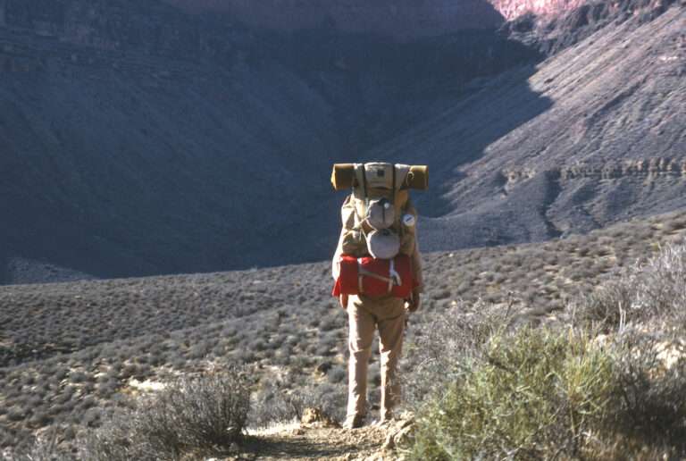 A man backpacking in the 1970s
