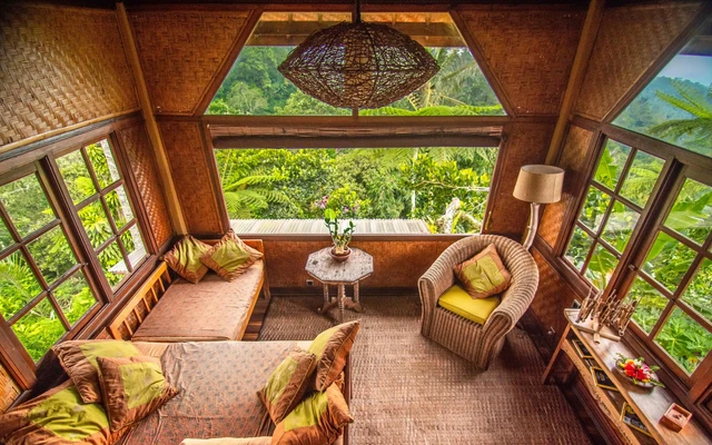 The Sarinbuana Eco Lodge overlooks forest  