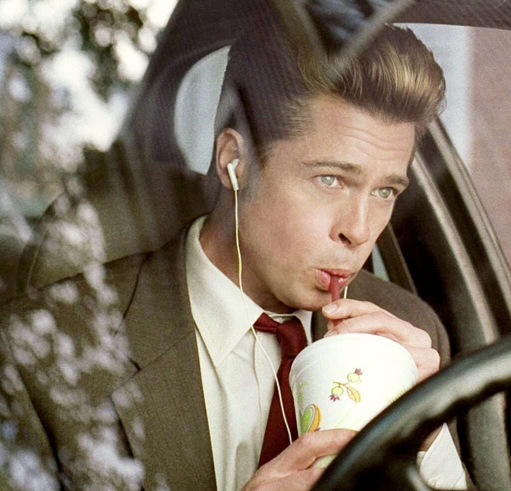Brad Pitt drinks a smoothie through a plastic straw in 2008's 'Burn After Reading'