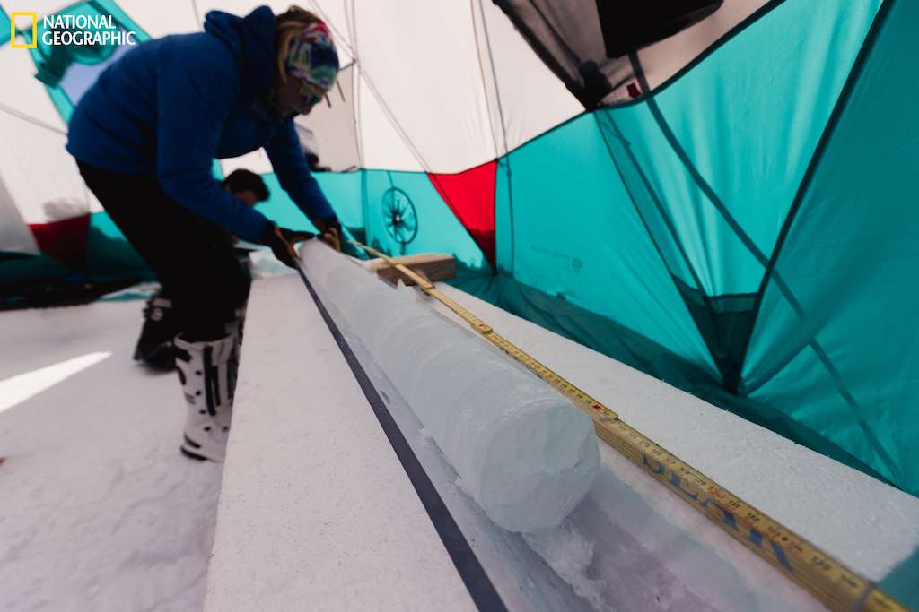 Analyzing a core sample taken from Mt. Logan's summit plateau ice cap, Kluane National Park and Reserve.