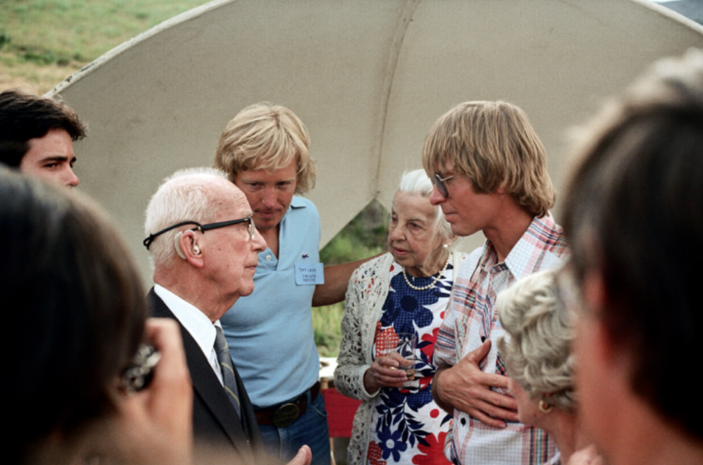 Fuller meets fan, musician John Denver in 1980