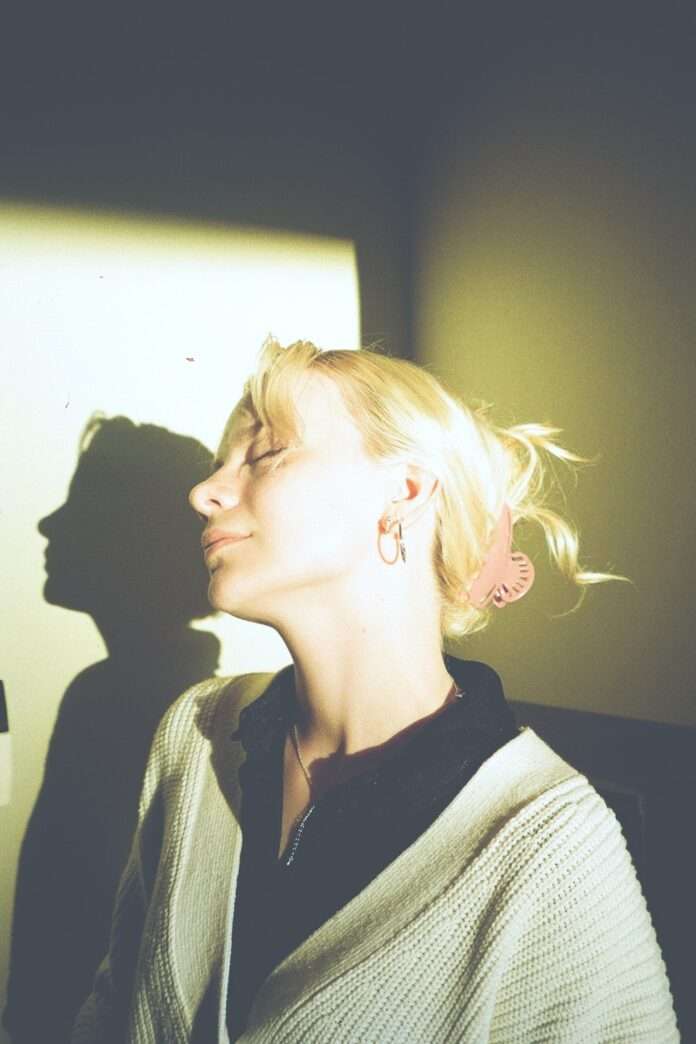 A woman with closed eyes