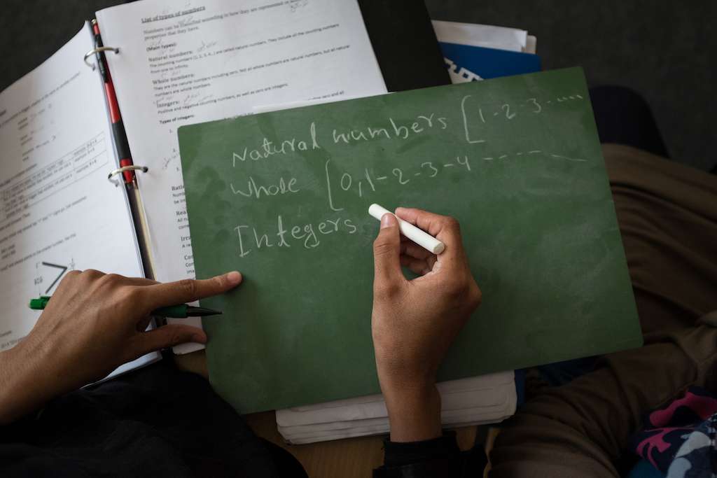 A student in a math class at the School of Leadership, Afghanistan
