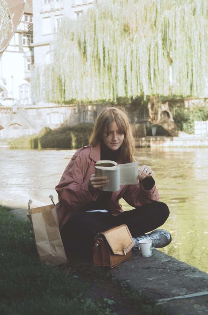 Reading by the river