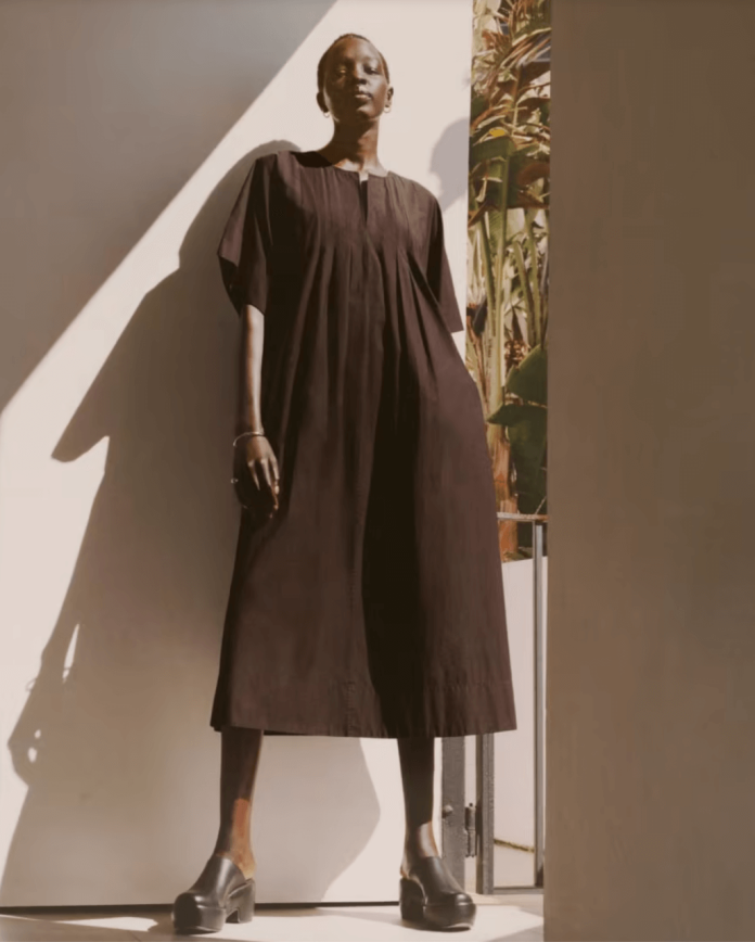 Woman in Everlane Dress.