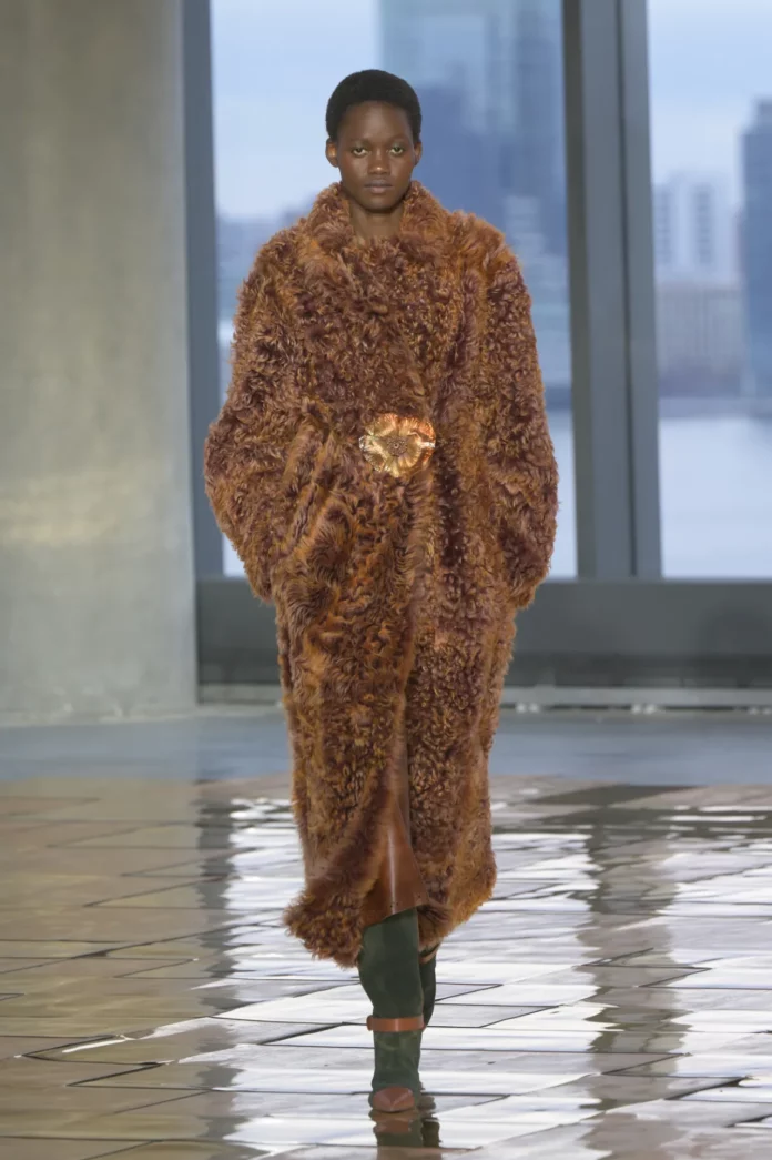 Model wears fur for Ulla Johnson show.