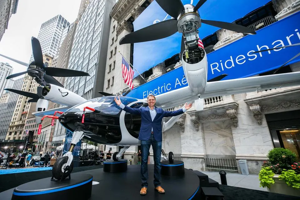 Joby founder JoeBen Bevirt with the air taxi