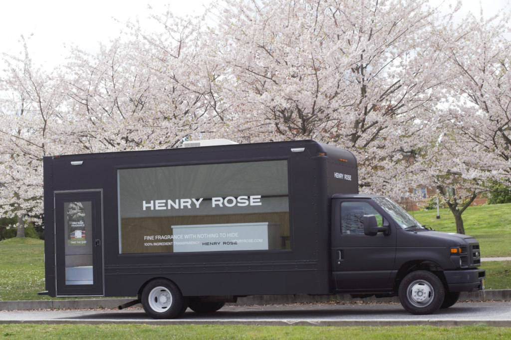 The glass Henry Rose perfume shop truck.