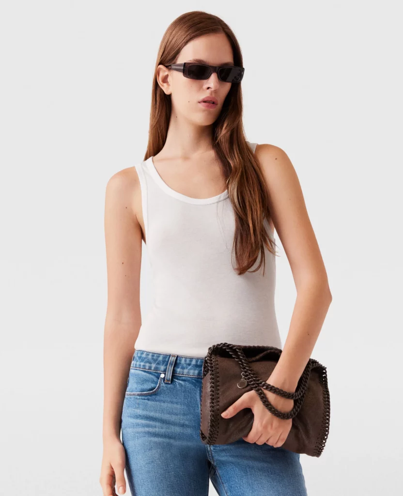 Model with the Airlite coated Stella McCartney Falabella bag.